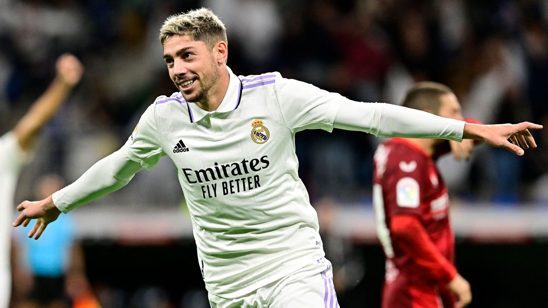 Real Madrid midfielder Valverde hits the ball into a balcony during the match against Rayo Vallecano