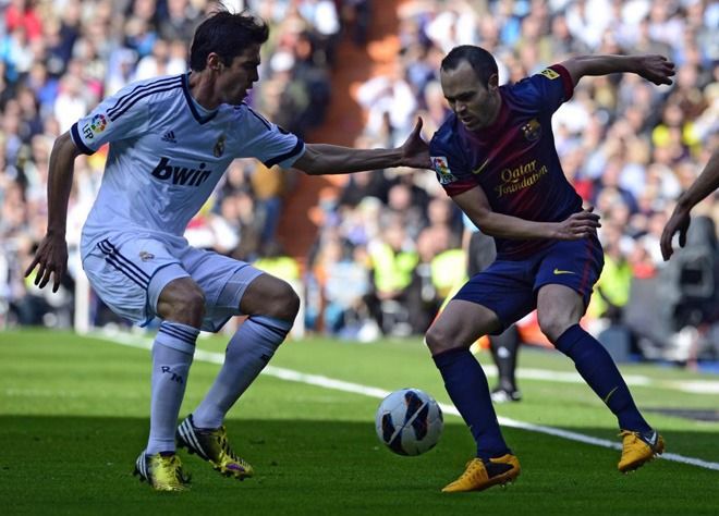 Kaká e Iniesta